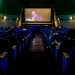Entriamo, per ammirare le 332 poltroncine blu poste davanti allo schermo che proietta pi che altro film di seconda visione